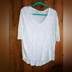 Larry Levine ladies top.  White with black speckles.  Size L. 98% poly 2%rayon